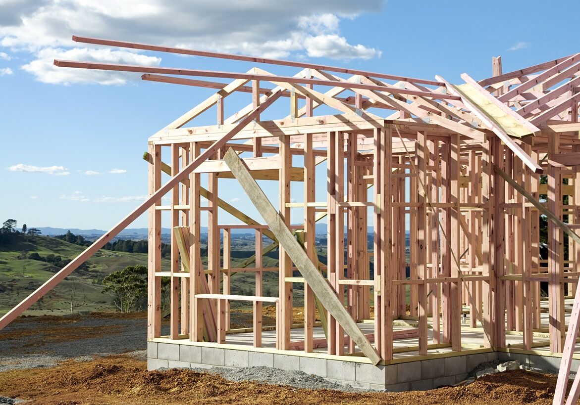 Timber frame construction of a house in rural New Zealand.